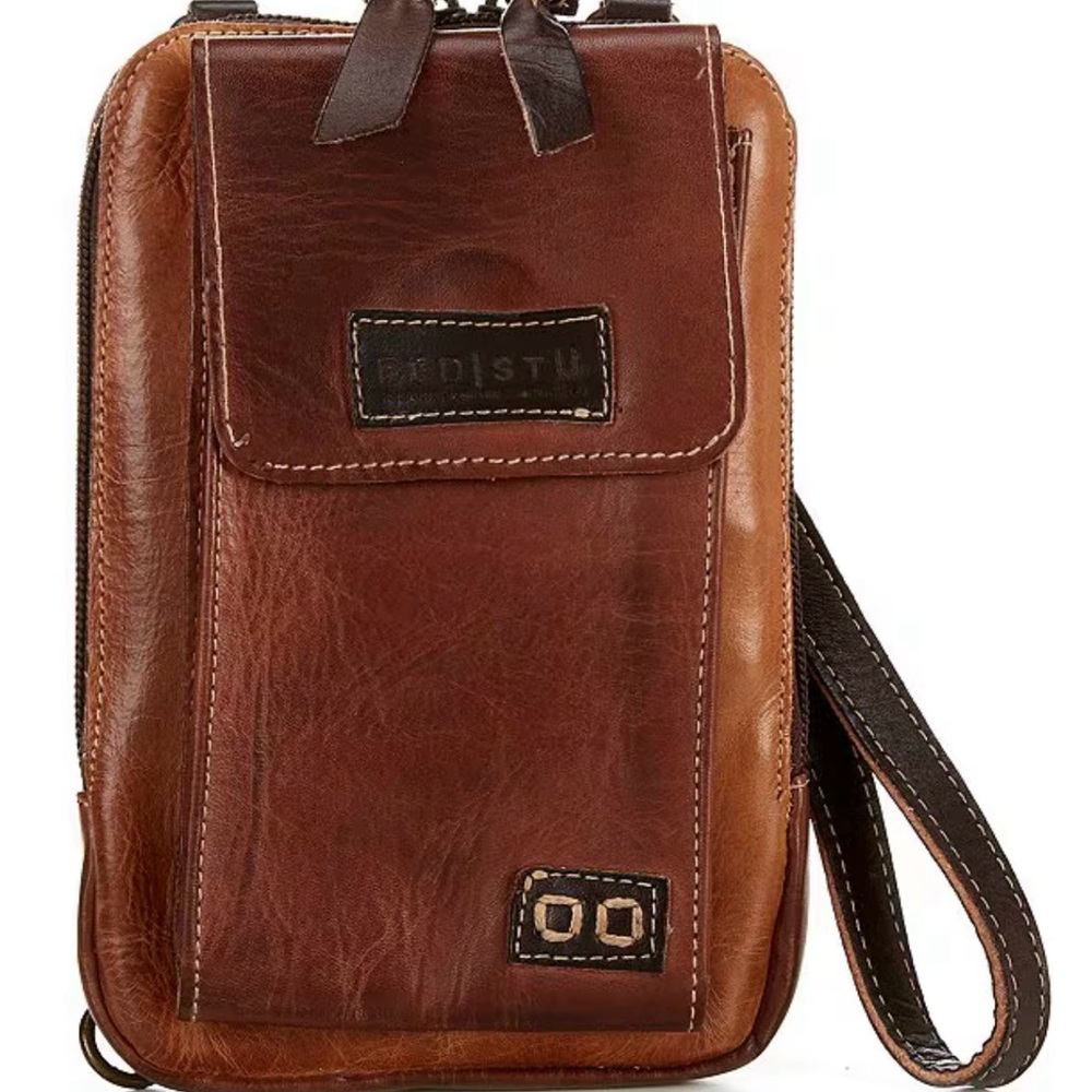 BED|STU Brown Leather Phone Case w/AdjStrap. Used twice.No flaws. Dillard’s